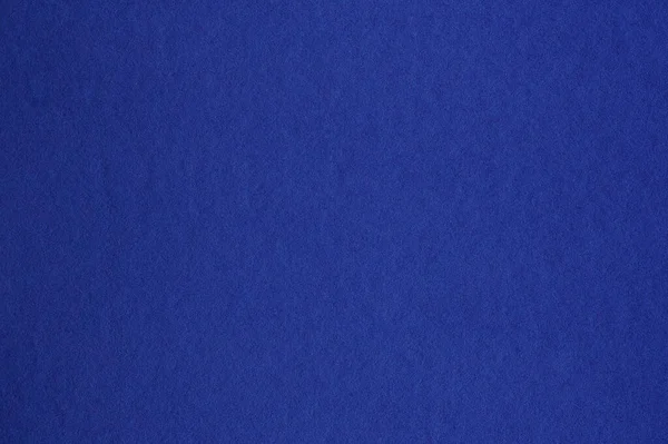 Close-up van naadloze donkerblauwe papieren textuur — Stockfoto
