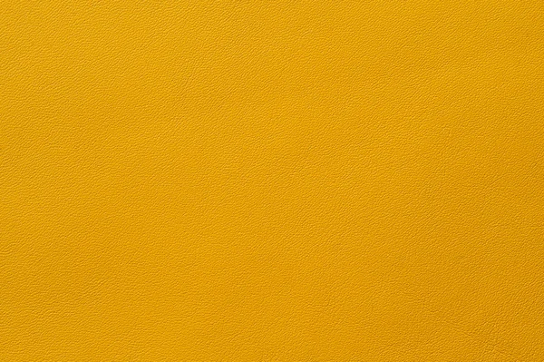 Крупный план гладкой желтой текстуры кожи — стоковое фото