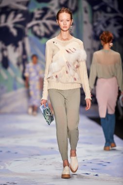 A model walks on the Alena Akhmadullina catwalk clipart