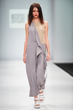 A model walks on the NATASHA DRIGANT catwalk