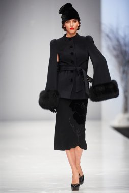 A model walks on the JULIA YANINA catwalk