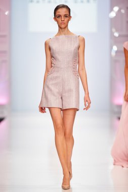 A model walks on the NATALIA GART catwalk