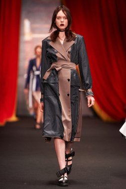 A model walks on the BESSARION catwalk