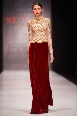 A model walks on the NE-TIGER catwal