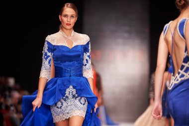 A model walks on the NE-TIGER catwal