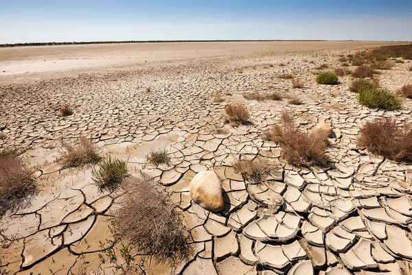 Aride en afval land — Stockfoto