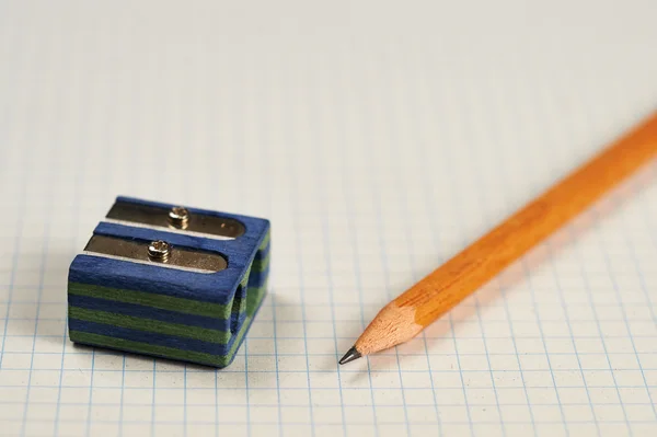 Pencil, sharpener and sheet — Stock Photo, Image