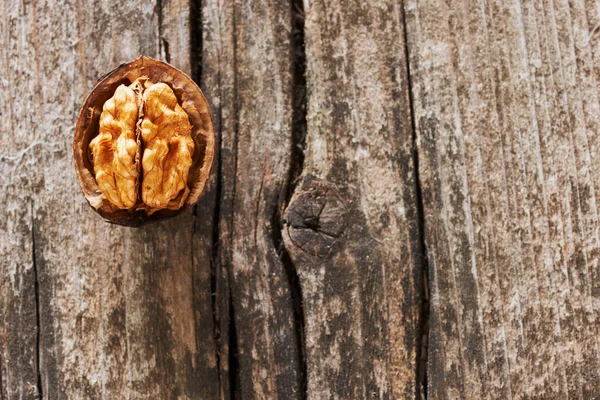 Delious walnut on an old table — Stock Photo, Image