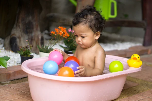 Asian baby boy taking a shower — Stock Photo, Image