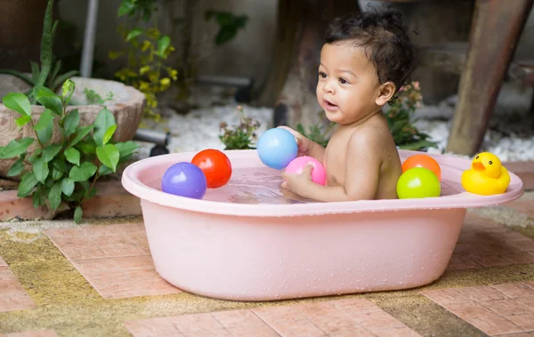 Asian baby boy taking a shower — Stock Photo, Image