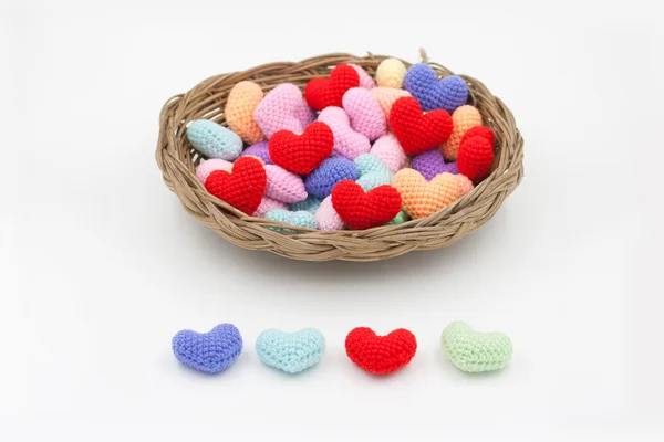 Yarn hearts in the basket. — Stock Photo, Image