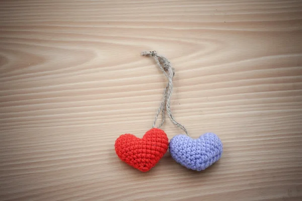 Vintage  Yarn hearts on wood background — Stock Photo, Image