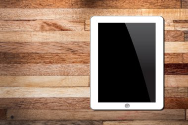 Ahşap arkaplanda tablet pc