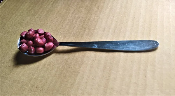 Cuchara Mesa Con Almendras Con Espacio Para Texto Fondo Marrón —  Fotos de Stock