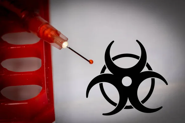 Blood Drop Tip Syringe Next Biohazard Symbol — 스톡 사진