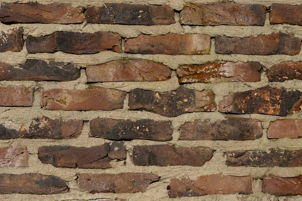 Vintage mortared brick wall background