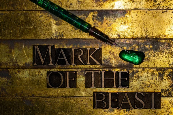 Mark Of The Beast text on textured grunge copper and vintage gold background