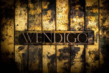 Wendigo metin grunge desenli bakır ve altın arkaplan