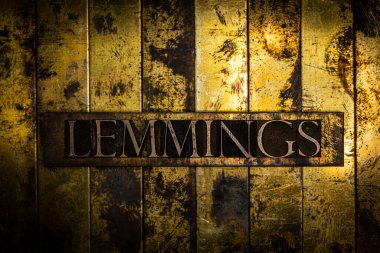 Grunge desenli bakır ve altın arkaplan üzerine Lemmings metni