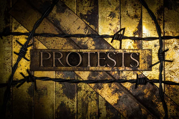 Protests Text Barbed Wire Grunge Textured Copper Gold Background — ストック写真