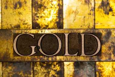 Dokulu grunge bakır ve klasik altın arkaplan üzerine altın metin