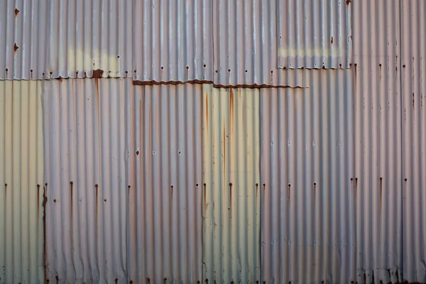 background of old iron panels in pastel colors