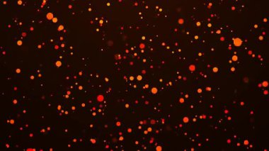 soyut parlak kırmızı ve turuncu parçacıklar, yumuşak ışık bokeh etkisi ve yumuşak hareket ile koyu arkaplanda yüzerler.