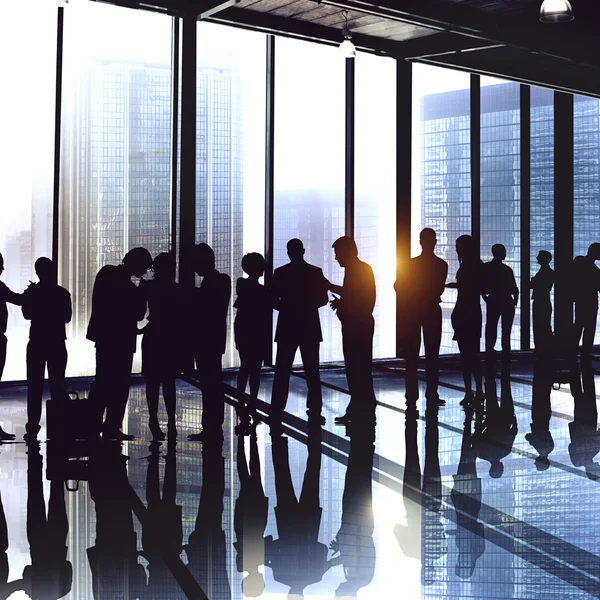 Mensen uit het bedrijfsleven tijdens zakelijke bijeenkomst — Stockfoto