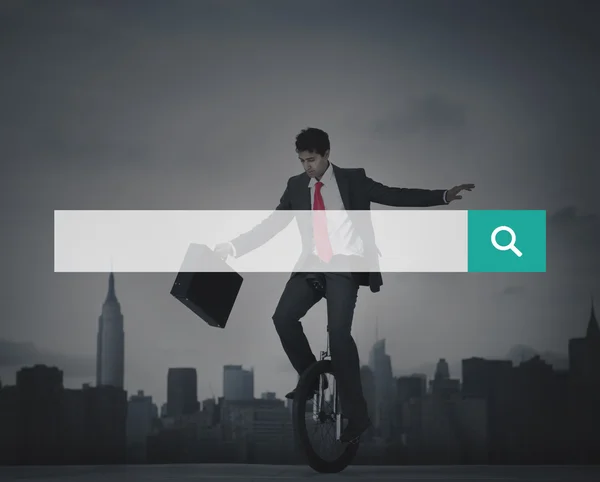 Hombre de negocios montar en bicicleta de una rueda —  Fotos de Stock