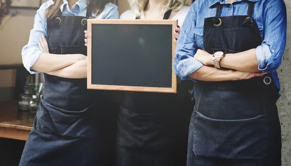 Team im Schürzen-Konzept — Stockfoto