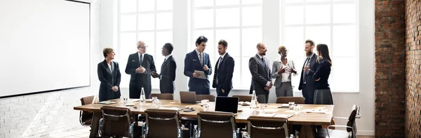 Zakenmensen op vergadering — Stockfoto