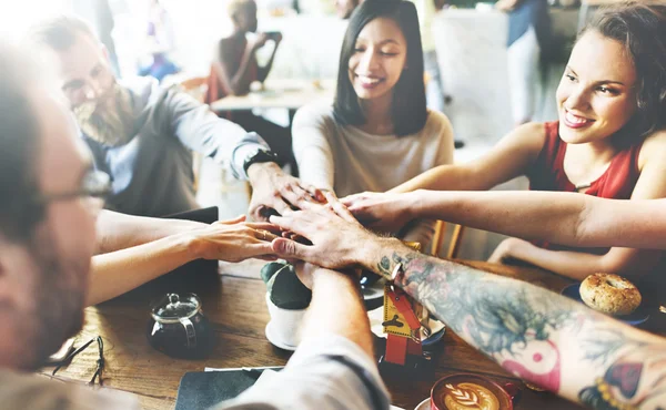 People making pile of hands — Stock Photo, Image