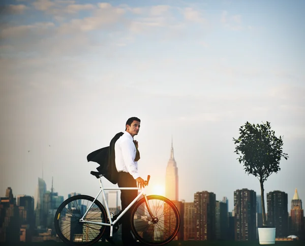 Businessman with Bicycle Concept
