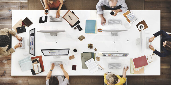 Business Team working on computers