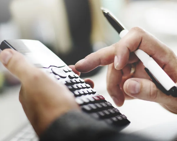 Businessman Calculating on calculator — Stock Photo, Image