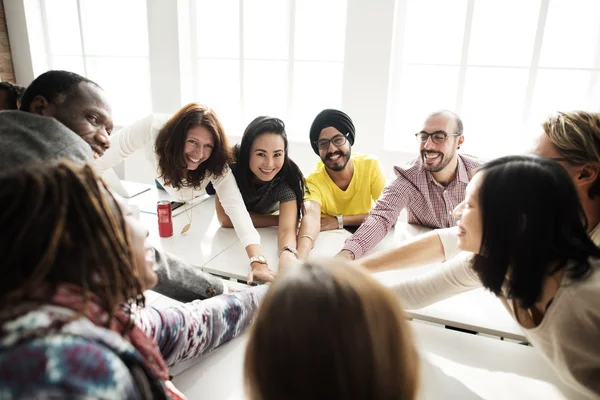 Equipo alegre Unirse a las manos — Foto de Stock