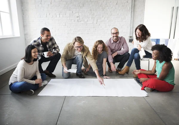 Designers working with poster — Stock Photo, Image