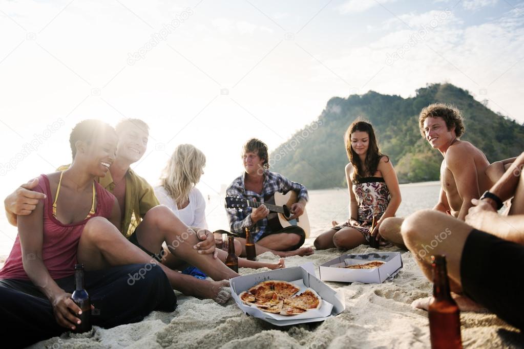 friends having a summer beach party.