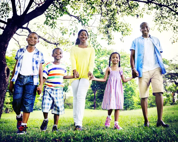 Beautiful african family in park — Stock Photo, Image