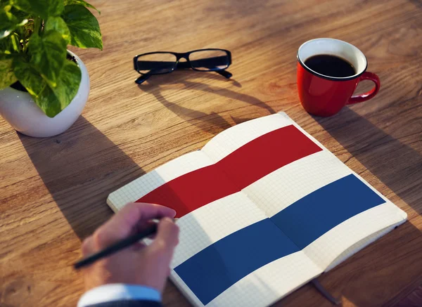 Man working with Netherland Country Flag — Stock Photo, Image