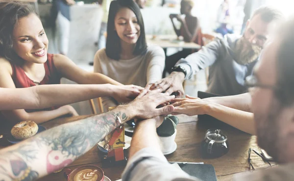 People making pile of hands — Stock Photo, Image