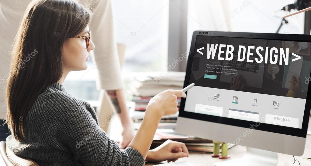 woman showing on monitor with web design