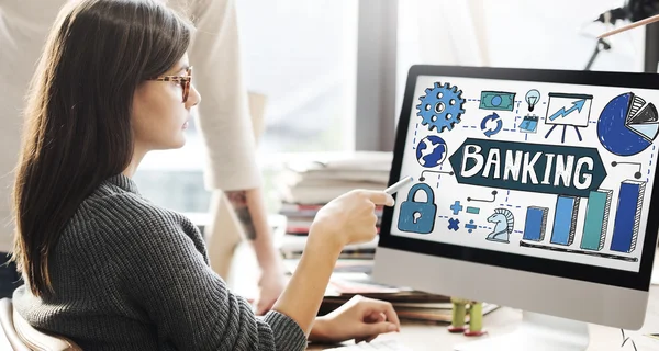 Woman showing on monitor with banking — Stock Photo, Image