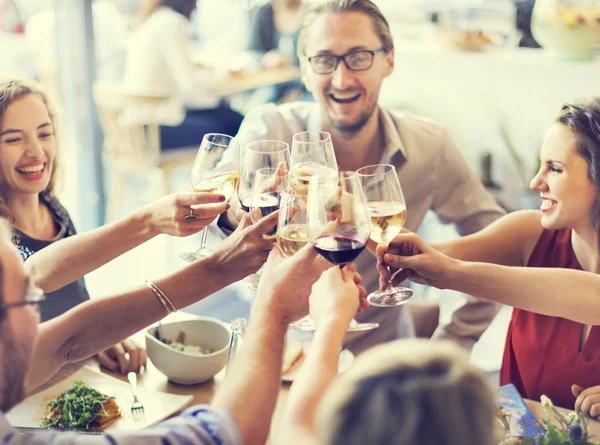 People cheers with glasses — Stock Photo, Image