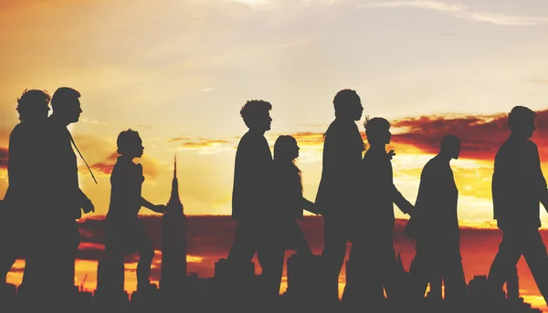 Business People silhouettes on sunset — Stockfoto