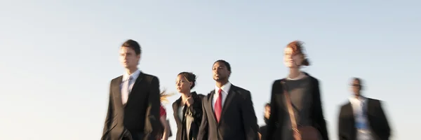 Silhouettes of Business People Walking — Stock Photo, Image