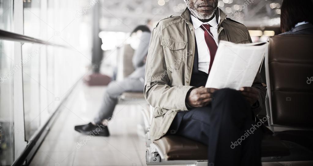 businessman reading newspaper