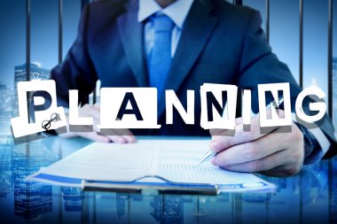 Planlama kavramı ile çalışan adam