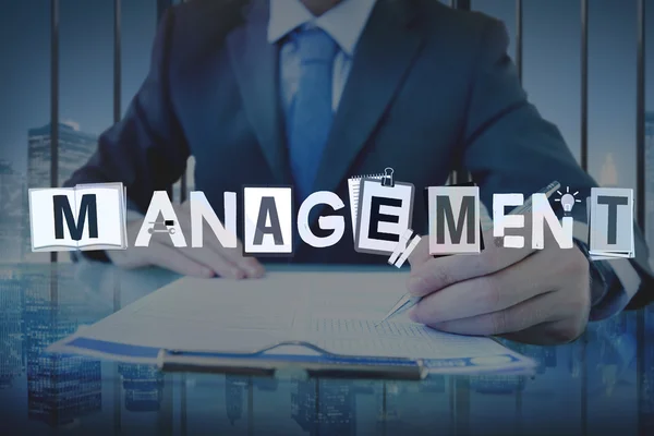 Man aan het werk met Management Concept — Stockfoto