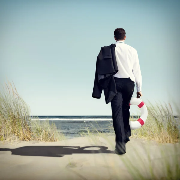 Businessman walking away — Stock Photo, Image